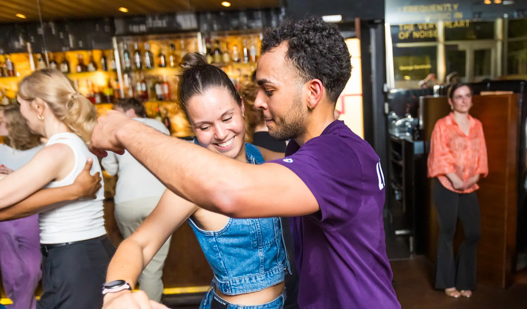 Salsa dancers performing at Armada Movement